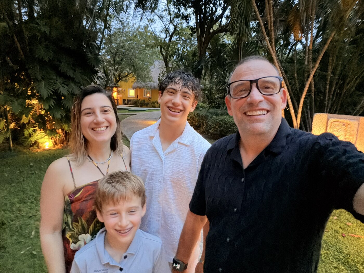 Ronnie outdoors with his three children